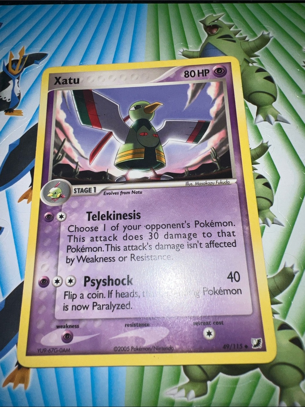 Pokemon Xatu Trading Card - Purple Artwork with Yellow Border